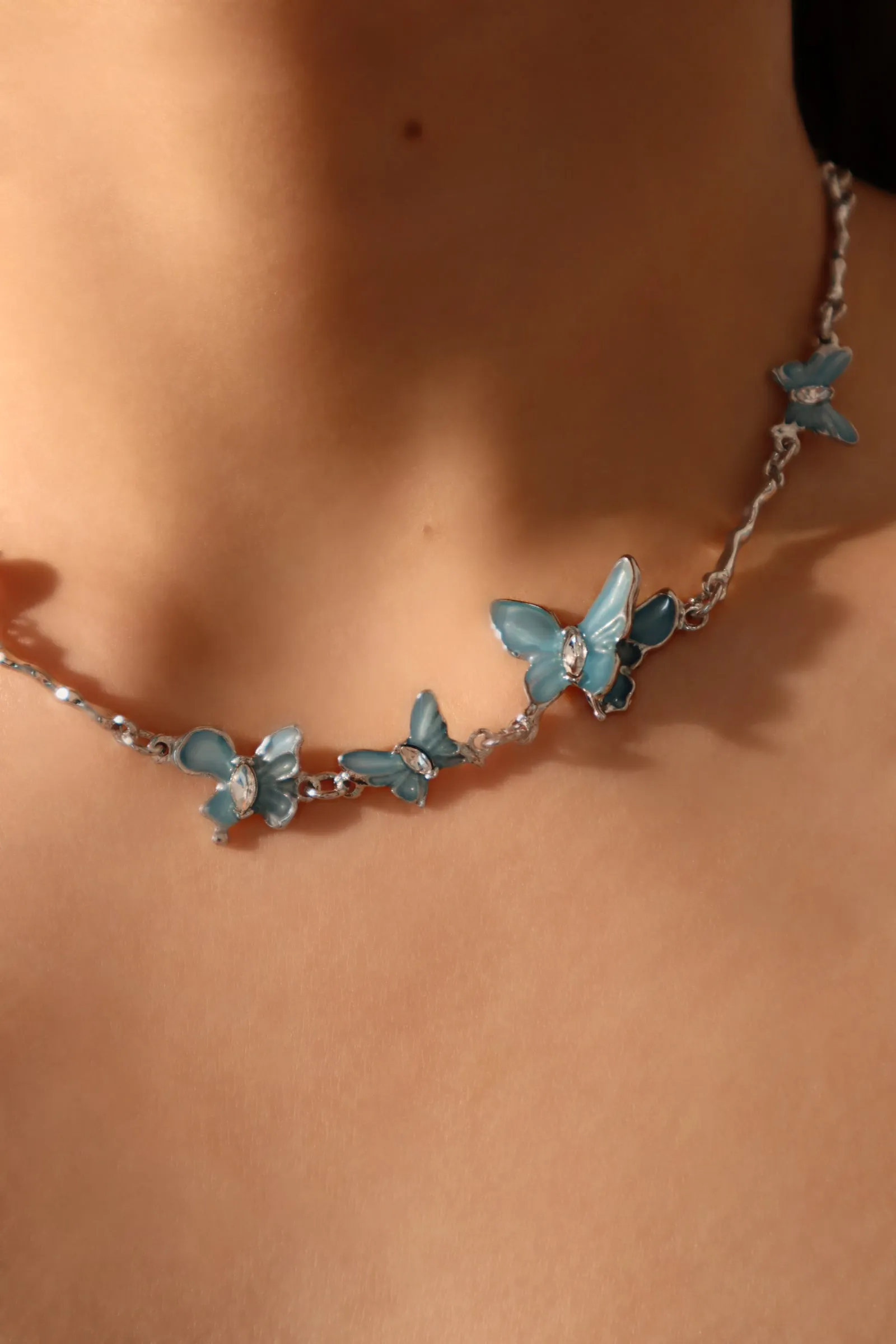 Platinum Plated Blue Butterfly Fluttering Necklace